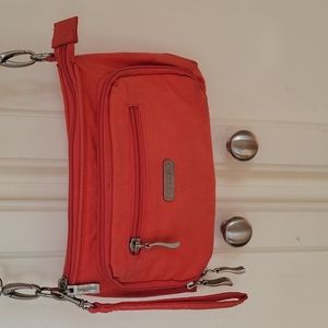 Baggallini small crossbody clutch purse coral yellow